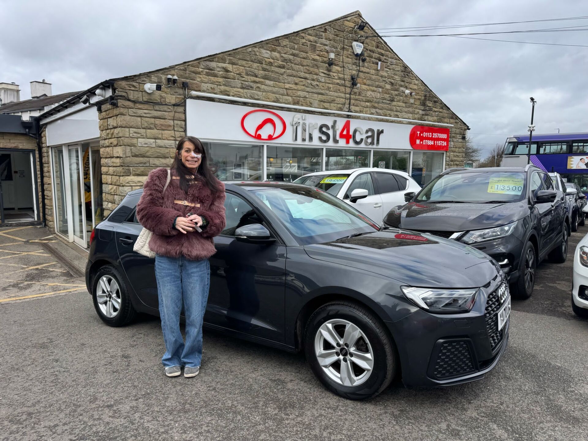 Ala from Leeds  collecting her new Audi A1