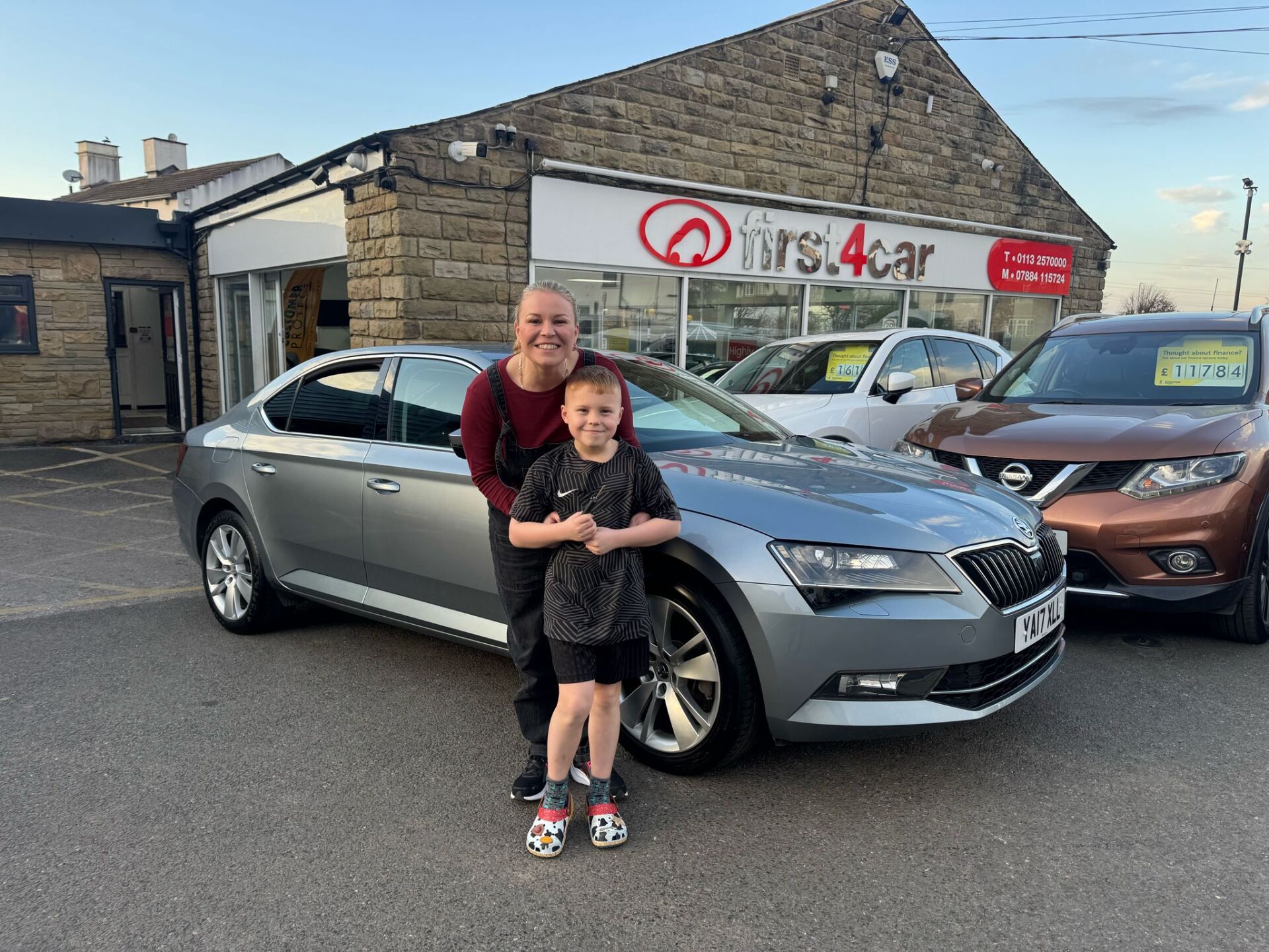 Charlene and her son from Bradford collecting their new Skoda Superb.