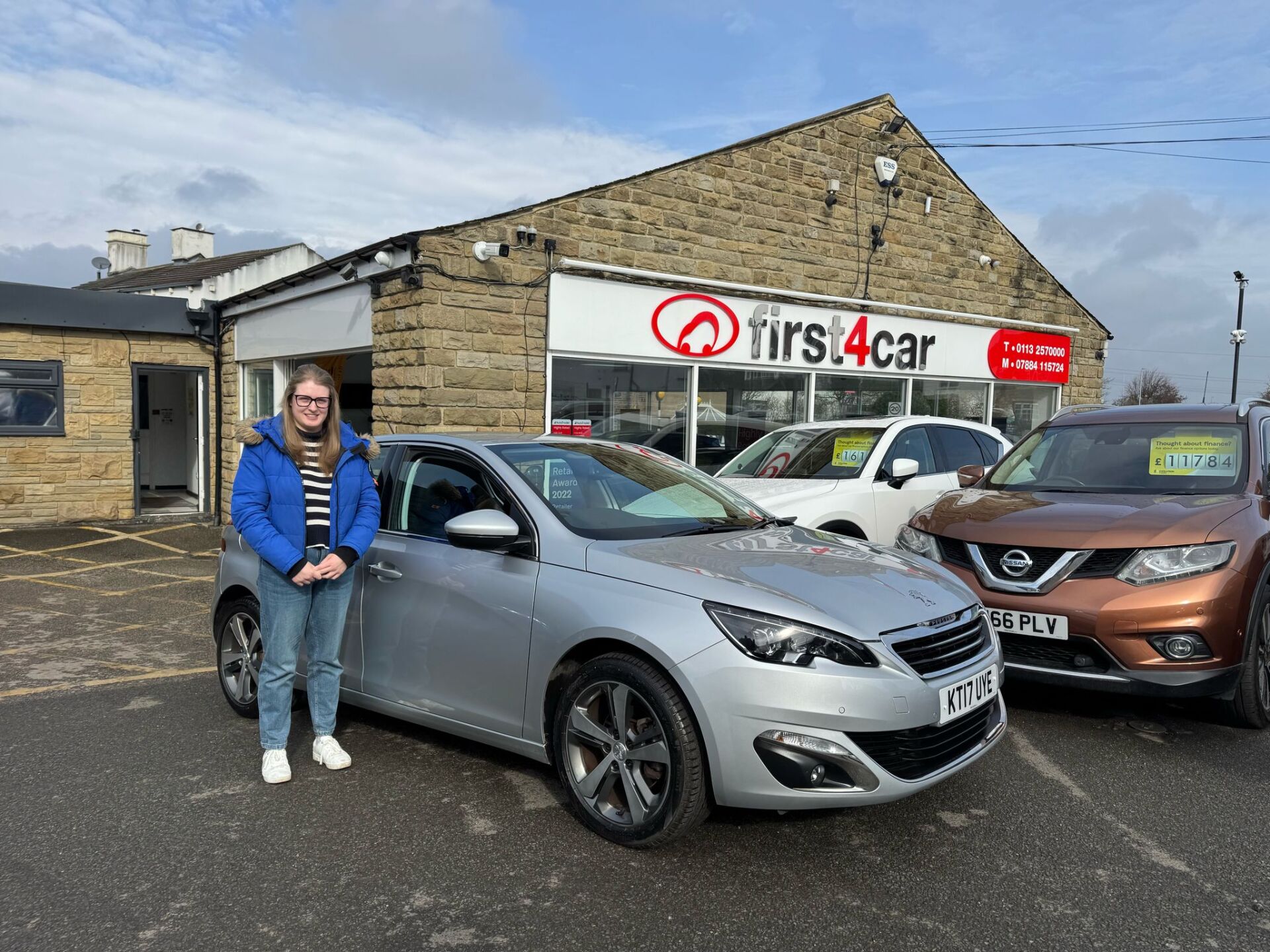 Laura from Thackley collecting her new Peugeot 308.