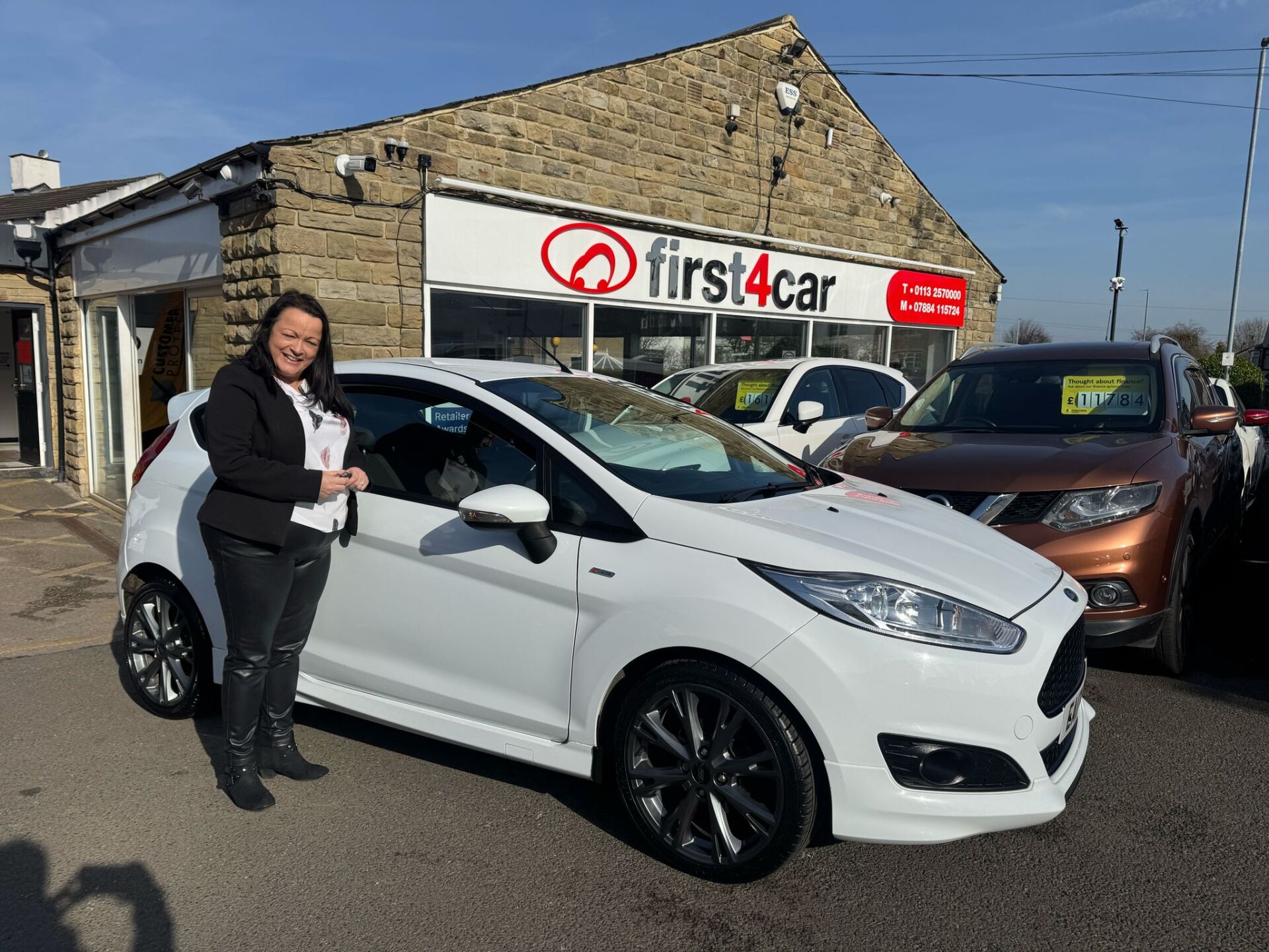 Sarah from Leeds collecting her new Ford Fiesta.