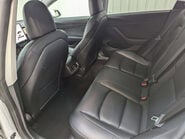 Tesla Model 3 Model 3 Standard-Range + 4dr 65