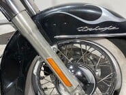 Harley-Davidson Softail Deluxe FLSTNI 1450 25