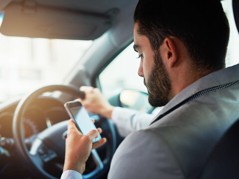 Using Mobile Phones While Driving