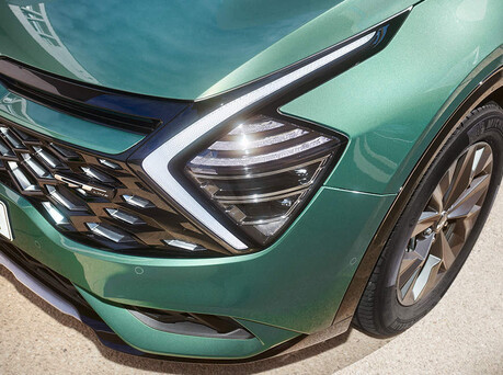 Up close image of Kia bumper and lights.