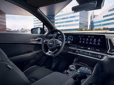 Image of driver's seat and steering wheel.