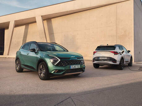 Image of two parked Kia Sportages.