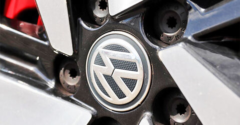 Close-up of Volkswagen alloy wheel with VW badge at Simply VW 2025, Beaulieu.