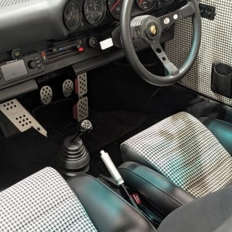 Brookspeed upholstery specialist working on bespoke leather car interior in Chandlers Ford